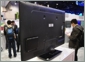 Haier mostra un televisore da 55-inch completamente wireless